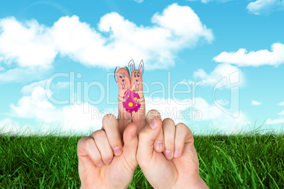 Composite image of fingers as easter bunny