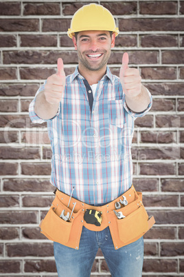 Composite image of happy repairman gesturing thumbs on white bac