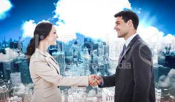 Composite image of future partners shaking hands