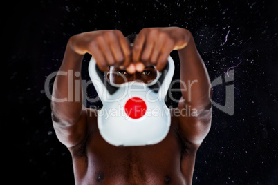 Composite image of shirtless fit young man lifting kettle bell