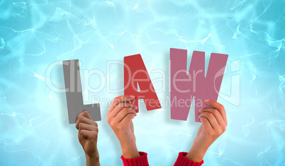 Composite image of hands holding up law