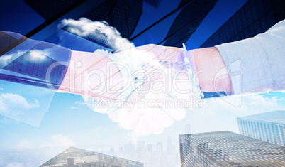 Composite image of business people in handcuffs shaking hands