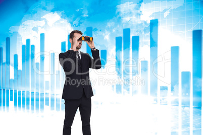 Composite image of elegant businessman standing and using binocu