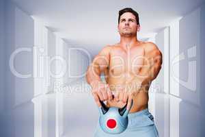 Composite image of bodybuilder holding kettlebell