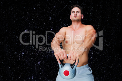 Composite image of bodybuilder holding kettlebell