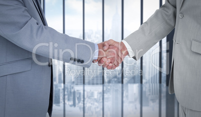 Composite image of side view of shaking hands