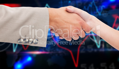 Composite image of close up of female and male hand shaking