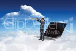 Composite image of businessman looking through telescope