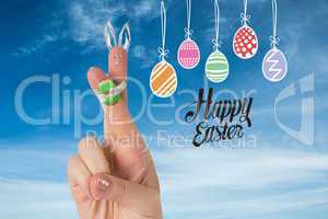 Composite image of fingers as easter bunny