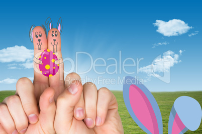 Composite image of fingers as easter bunny