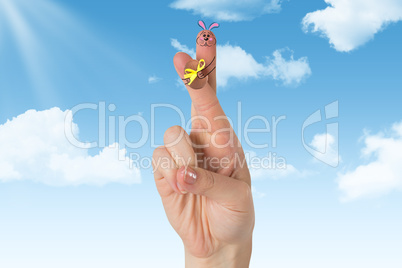 Composite image of fingers as easter bunny