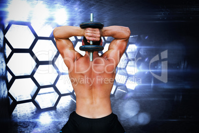 Composite image of bodybuilder lifting dumbbell