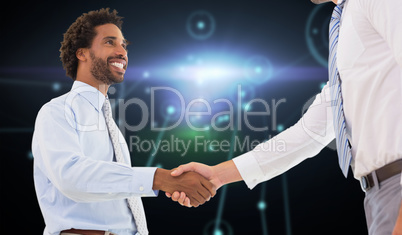 Composite image of two businessmen shaking hands in office