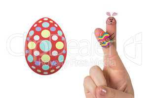 Composite image of fingers as easter bunny