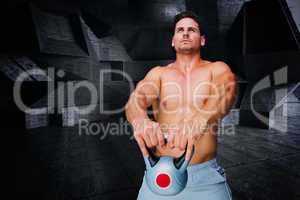 Composite image of bodybuilder holding kettlebell