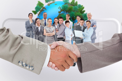 Composite image of side view of shaking hands