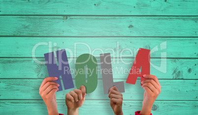 Composite image of hands holding up hola