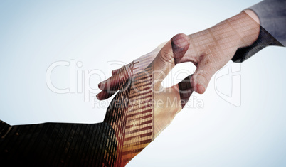 Composite image of businesspeople going to shake hands