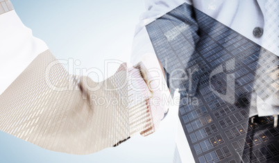 Composite image of people in suit shaking hands