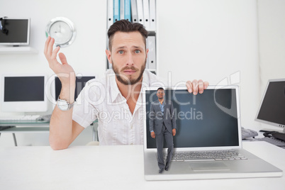 Composite image of businessman standing looking at camera