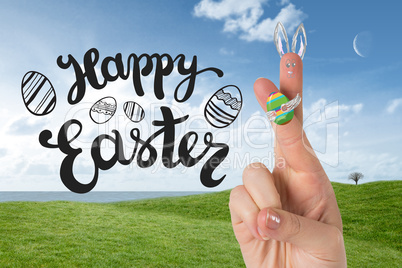 Composite image of fingers as easter bunny