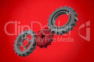 Composite image of cogs and wheels