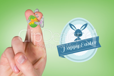 Composite image of fingers as easter bunny