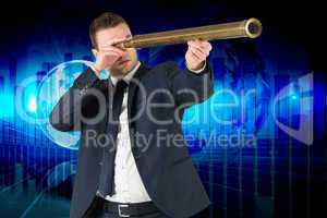 Composite image of businessman looking through telescope