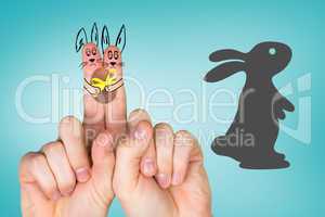 Composite image of fingers as easter bunny