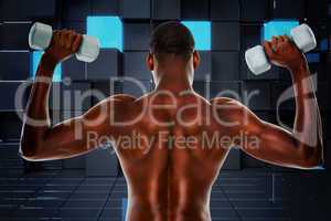 Composite image of rear view of a fit shirtless man lifting dumb