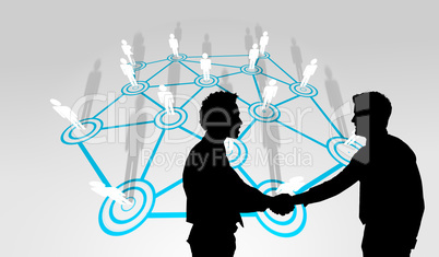 Composite image of smiling young businessmen shaking hands in of