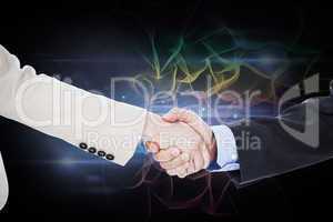 Composite image of smiling business people shaking hands while l