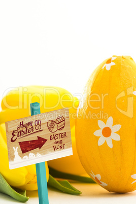 Composite image of easter egg hunt sign