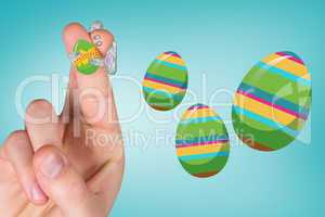 Composite image of fingers as easter bunny