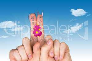 Composite image of fingers as easter bunny