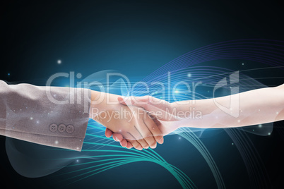 Composite image of handshake between two women