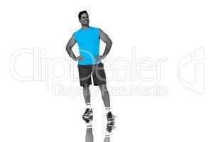 Composite image of full length portrait of a fit young man smili