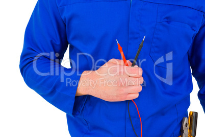 Electrician holding multimeter