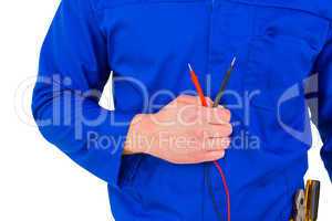 Electrician holding multimeter