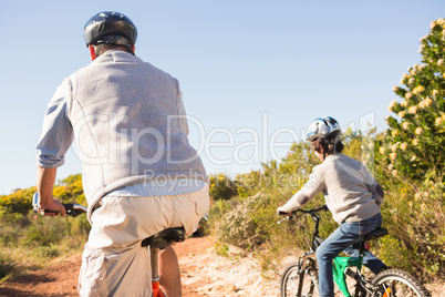 Father and son on a bike ride