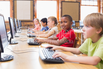 Cute pupils in computer class