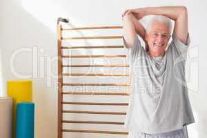 Senior man stretching