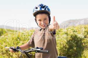 Little boy on a bike ride