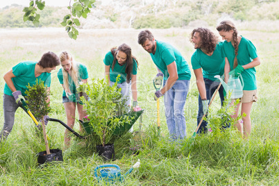 Happy friends gardening for the community