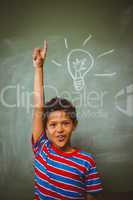 Little boy raising hand in classroom