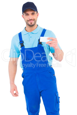 Handyman holding visiting card
