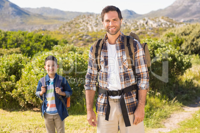 Father and son on a hike together