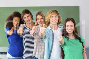 College students gesturing thumbs up