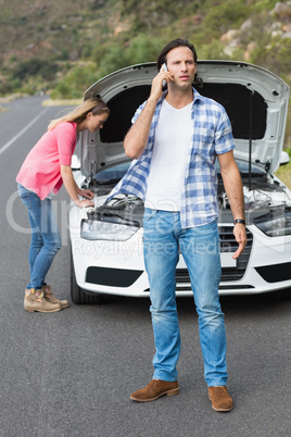 Couple after a car breakdown