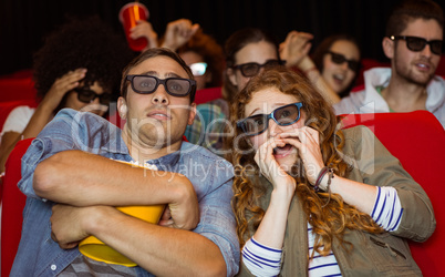 Young friends watching a 3d film